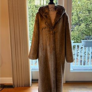 Pristine long faux fur coat. Worn only 2-3 times. Size large. Must message me.